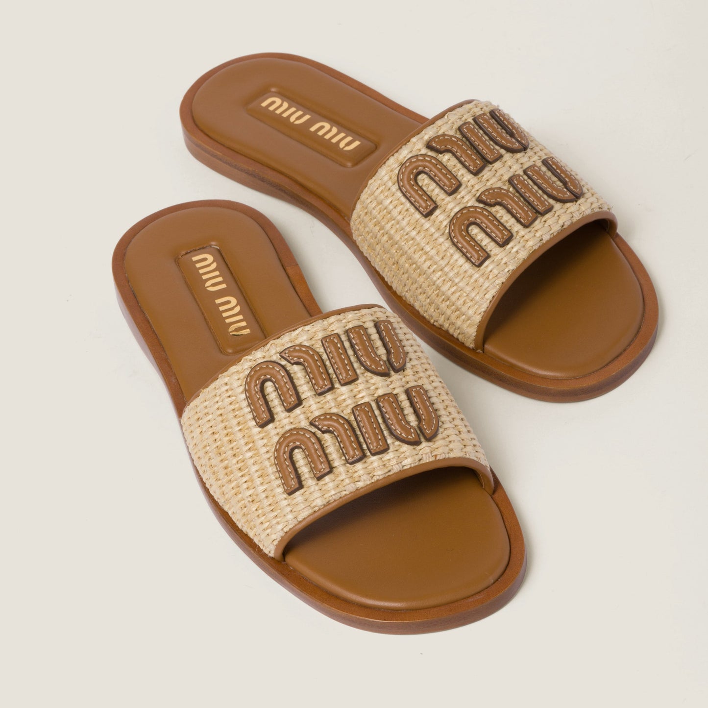 Miu Miu – Claquettes en toile et cuir