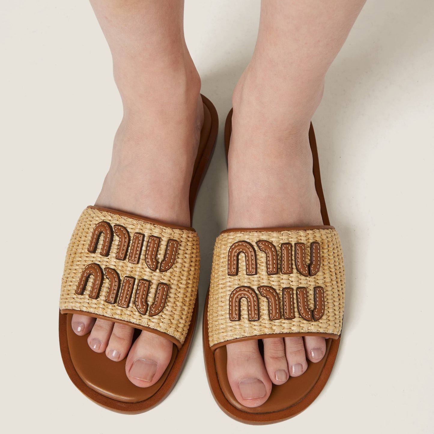 Miu Miu – Claquettes en toile et cuir